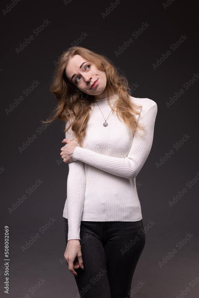 Portrait of thoughtful, dissatisfied, pensive young woman. Blong girl face isolated. Emotional woman immersed in your thoughts Portrait of thoughtful, dissatisfied, pensive young woman. Blong girl face isolated. Emotional woman immersed in your thoughts
