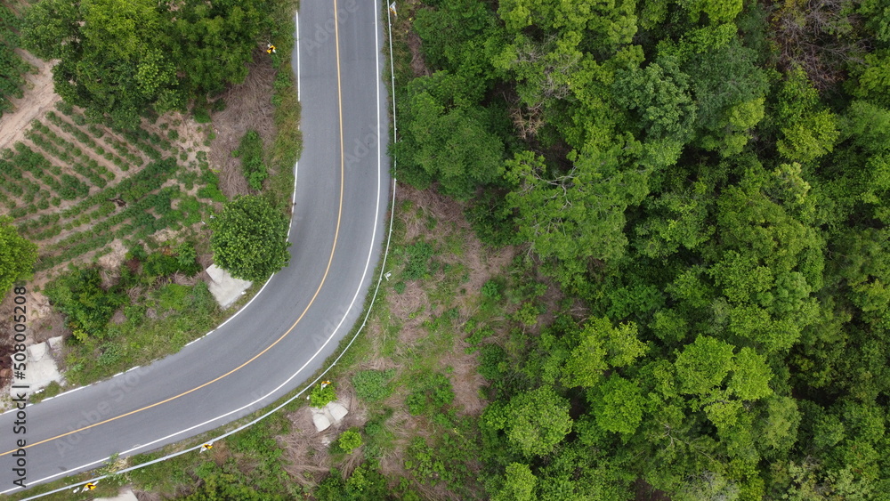  top view of  road aerial view  tropical mountains landscape.