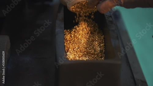 This stock video shows the process of making gold bars from precious metal granules. This video will decorate your projects.