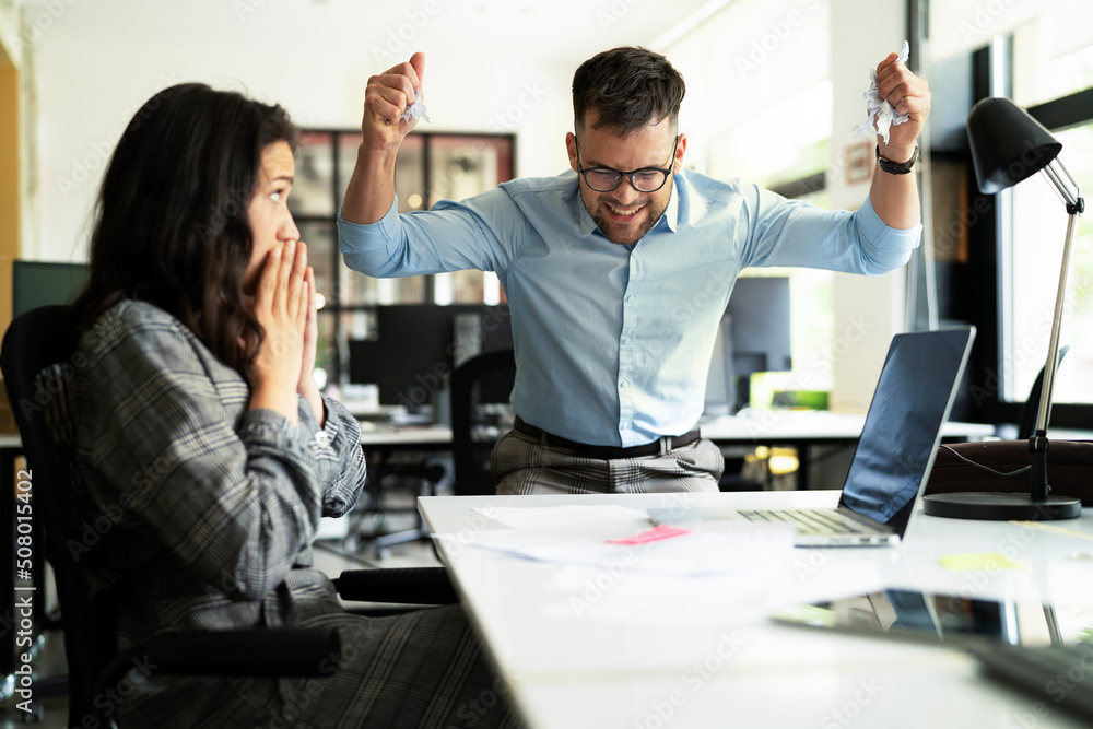 Colleagues arguing in office. Angry businessman yelling at his collegue.. Colleagues arguing in office. Angry businessman yelling at his collegue..