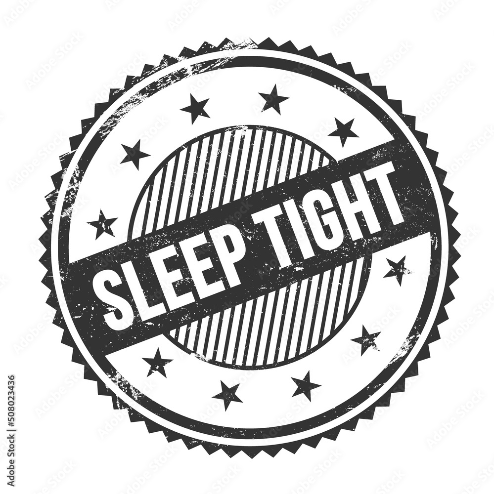 SLEEP TIGHT text written on black grungy round stamp.