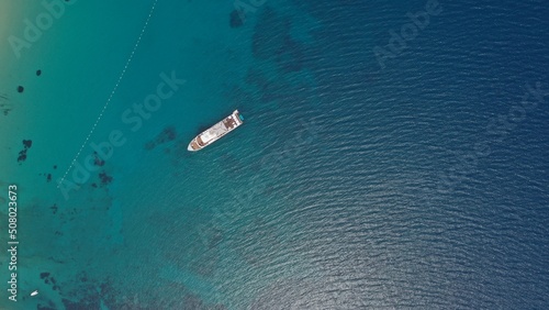 Aerial view of a cruise boat on amazing bay. © Tarik GOK