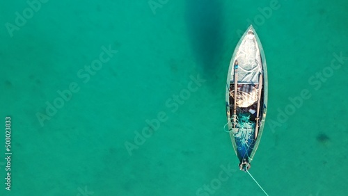 Aerial view of a fisherman boat on amazing bay. © Tarik GOK