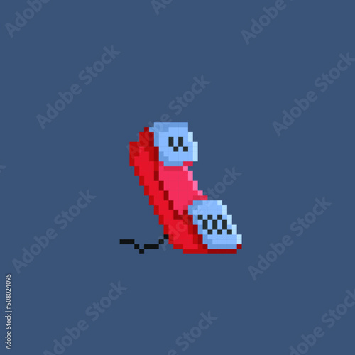 red telephone in pixel art style