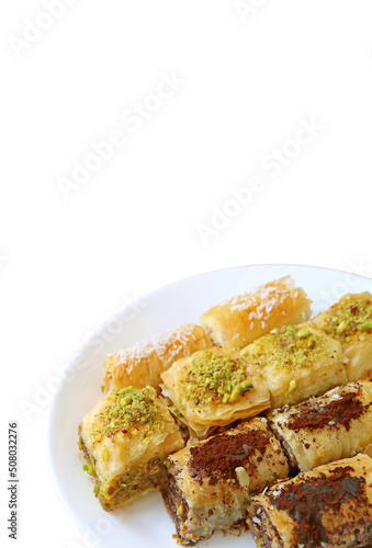 Plate of Delectable Assorted Baklava Pastries Isoaed on White Backdrop photo