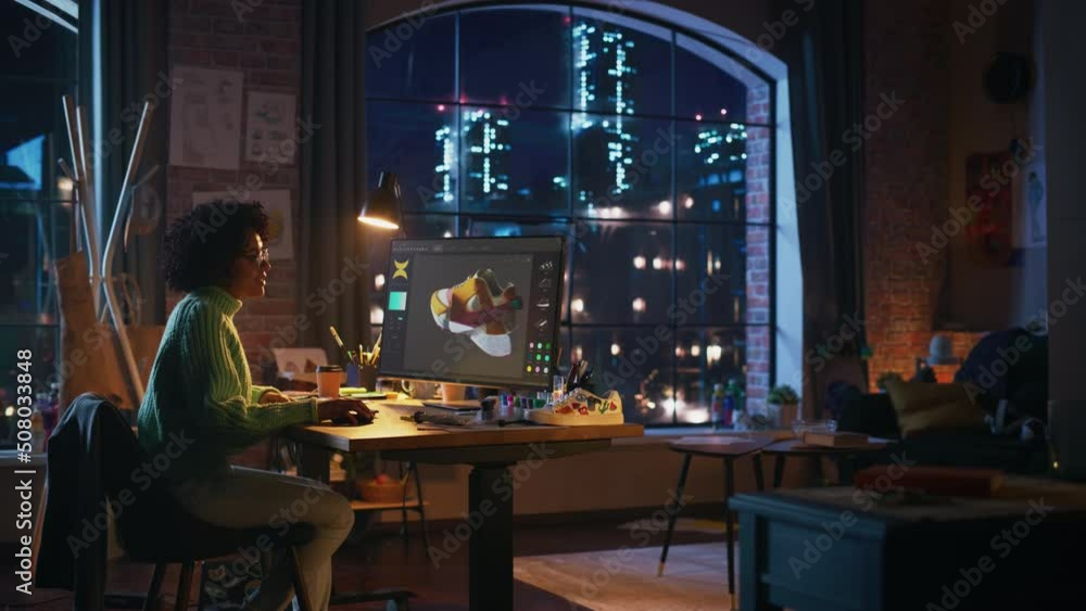 Multiracial Female Comes Up with Design of Sneakers by Reproducing It in the Program for 3d Visualisation. She Changes Colour and Looking at Model from Different Sides Multiracial Female Comes Up with Design of Sneakers by Reproducing It in the Program for 3d Visualisation. She Changes Colour and Looking at Model from Different Sides