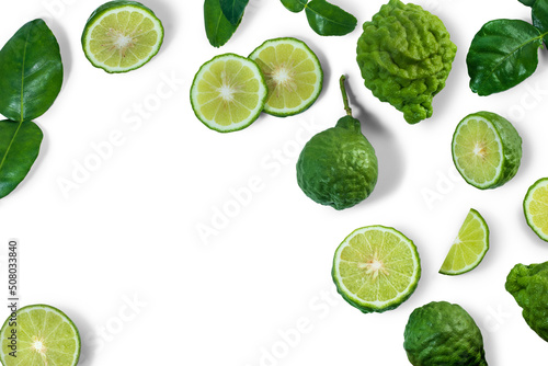 bergamot or kaffir with slice and leaves isolated on white background , top view , flat lay. © phadungsakphoto