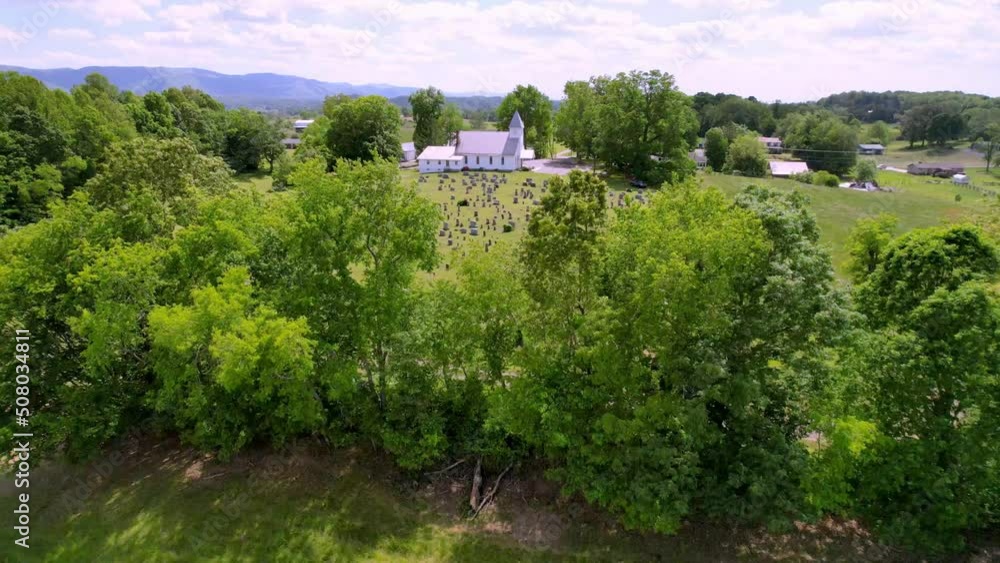 aerial low fast pullout over treetops from church near abingdon and damascus virginia aerial low fast pullout over treetops from church near abingdon and damascus virginia