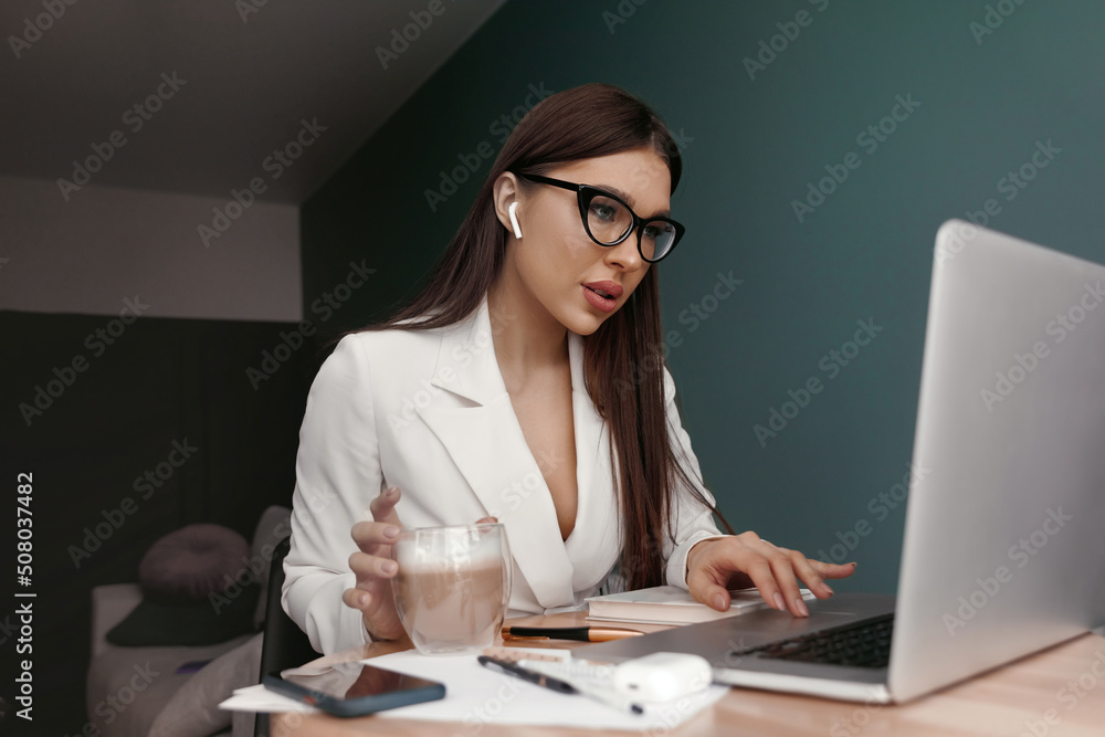 Portrait of beautiful young woman working in the office Portrait of beautiful young woman working in the office