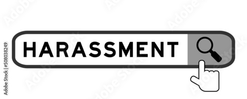 Search banner in word harassment with hand over magnifier icon on white background