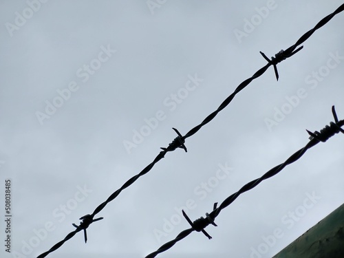 Barbed wire on the fence. Slovakia 