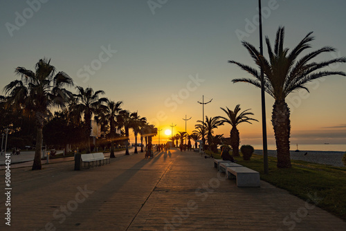 Fotografie, Obraz Sunset at Batumi Boulevard, seaside in Batumi, Georgia