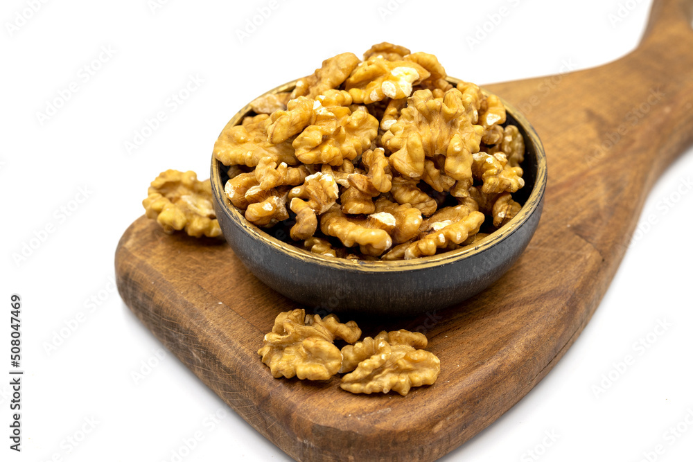 Walnut on white background. Close-up walnut kernel Walnut on white background. Close-up walnut kernel
