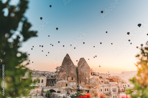 hot air balloons over Cappadocia at sunrise