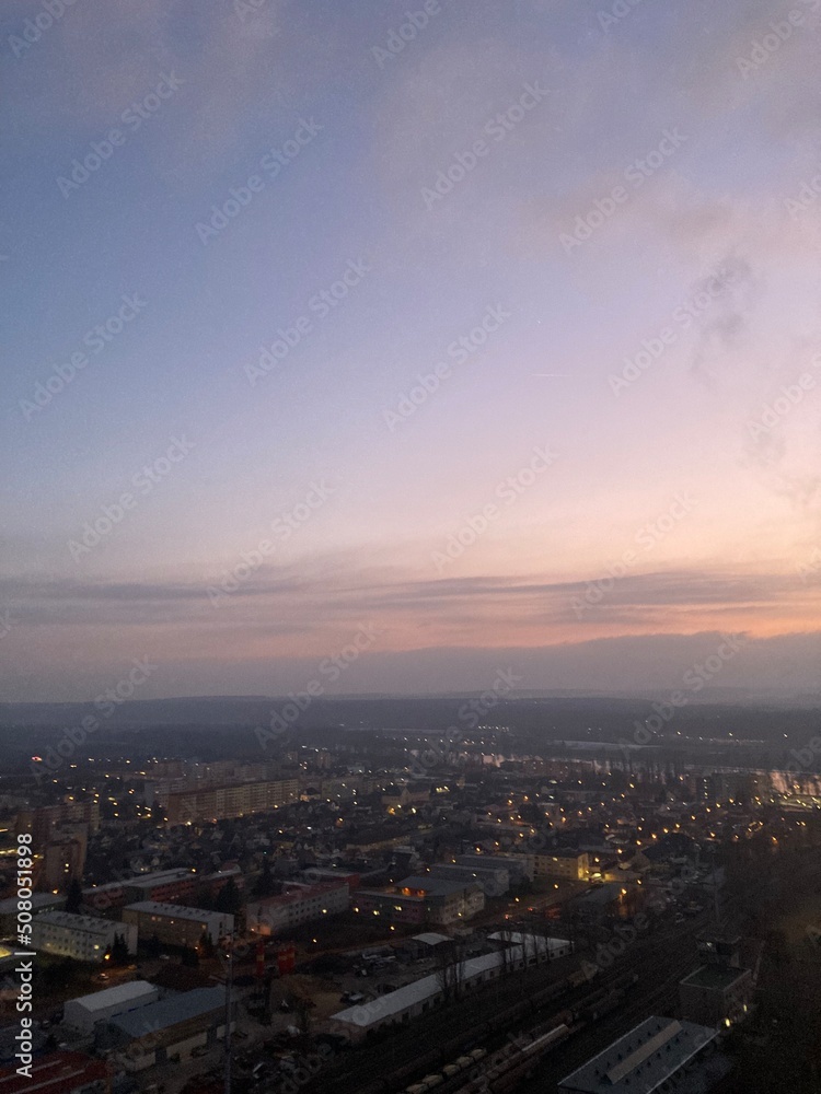 time clouds over city