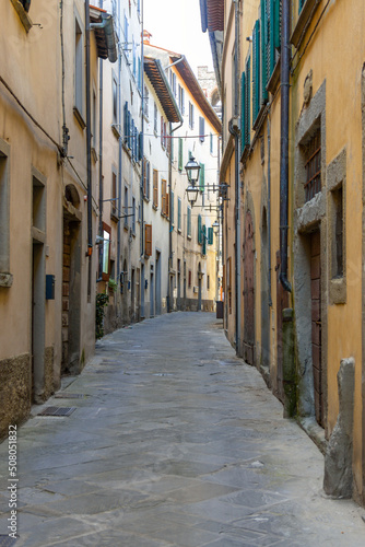 Narrow street in the medieval town of Bibbiena, Tuscany, Italy.