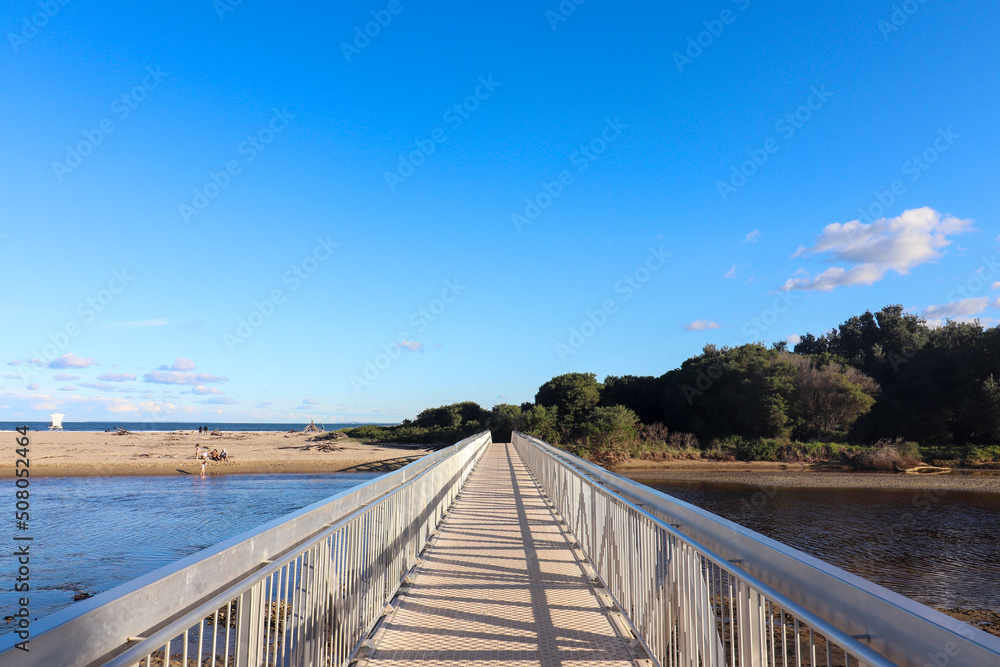 Pedestrian bridge over crooked river at Gerroa South Coast NSW 