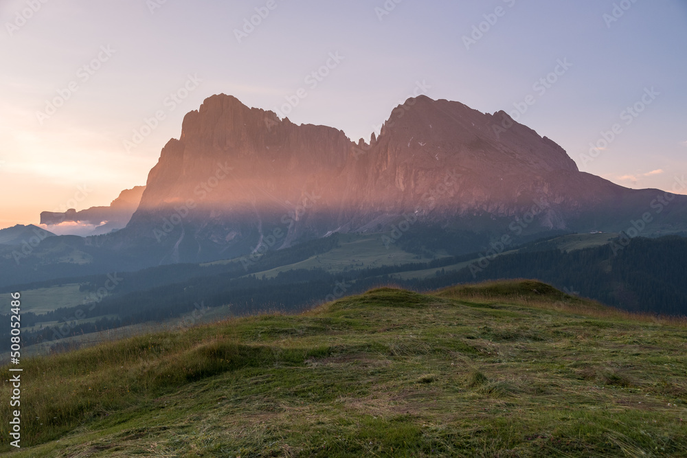 Beautiful sunrise on the meadows of Alpe di Siusi in the Italian Dolomites