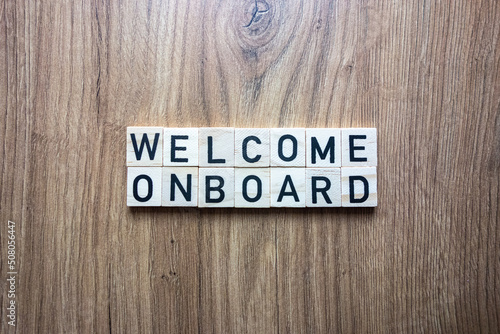 Welcome onboard text from wooden blocks photo