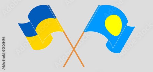 Crossed and waving flags of Ukraine and Palau