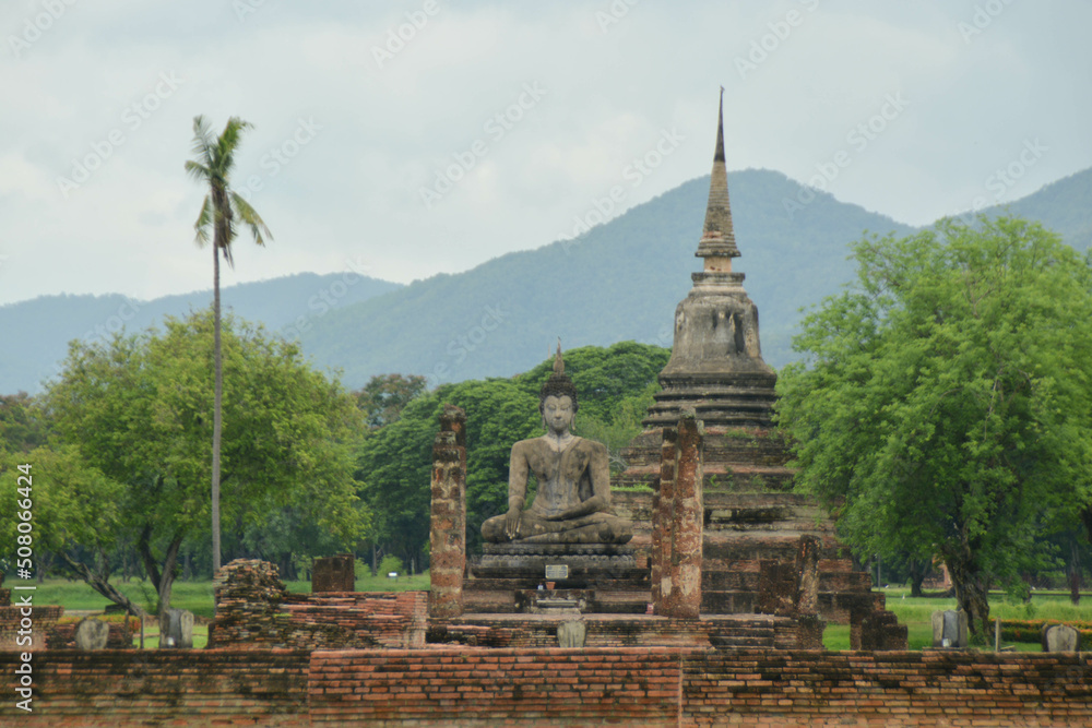 Close-up Buddha statue of Wat Mahathat at the Historical Park in Sukhothai.