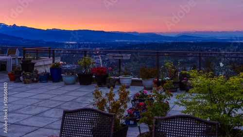 Crack of dawn on a Spring morning over Fraser Valley, BC, as viewed from a Univercity Highlands rooftop patio garden.