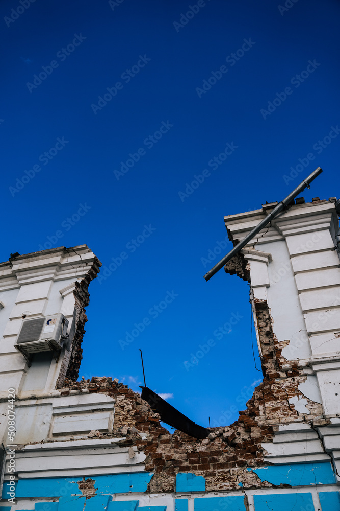 Destroyed and burnt civilian houses and shops in the town of Trostyanets. Sumy region. Civil buildings. Russian military invasion of Ukraine. Destroyed and burnt civilian houses and shops in the town of Trostyanets. Sumy region. Civil buildings. Russian military invasion of Ukraine.