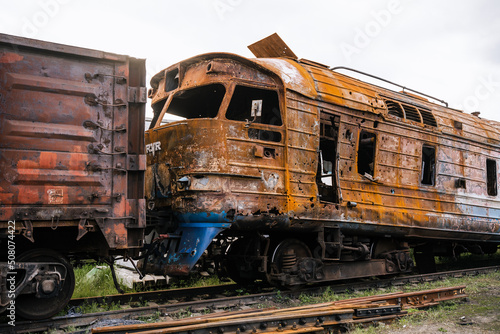 Exploded trains and wagons at the railway station in the city of Trostyanets. Sumy region. Civil buildings. Russian military invasion of Ukraine.