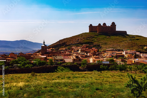 Calahorra castle in Andalusia, Spain. Behind the castle you can see the Sierra Nevada photo