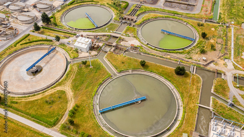Quadro su tela Aerial view of the tanks of a sewage and water treatment plant enabling the discharge and re-use of waste water