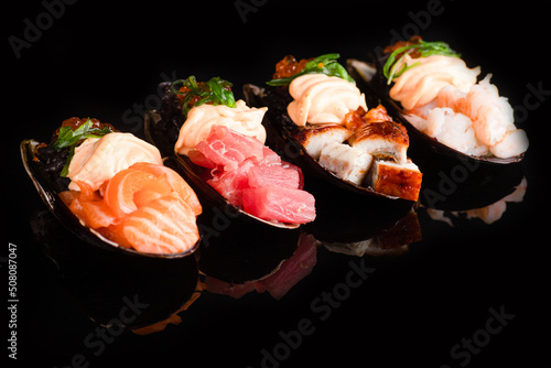 Sushi, rolls, sushi on a black background, mussels