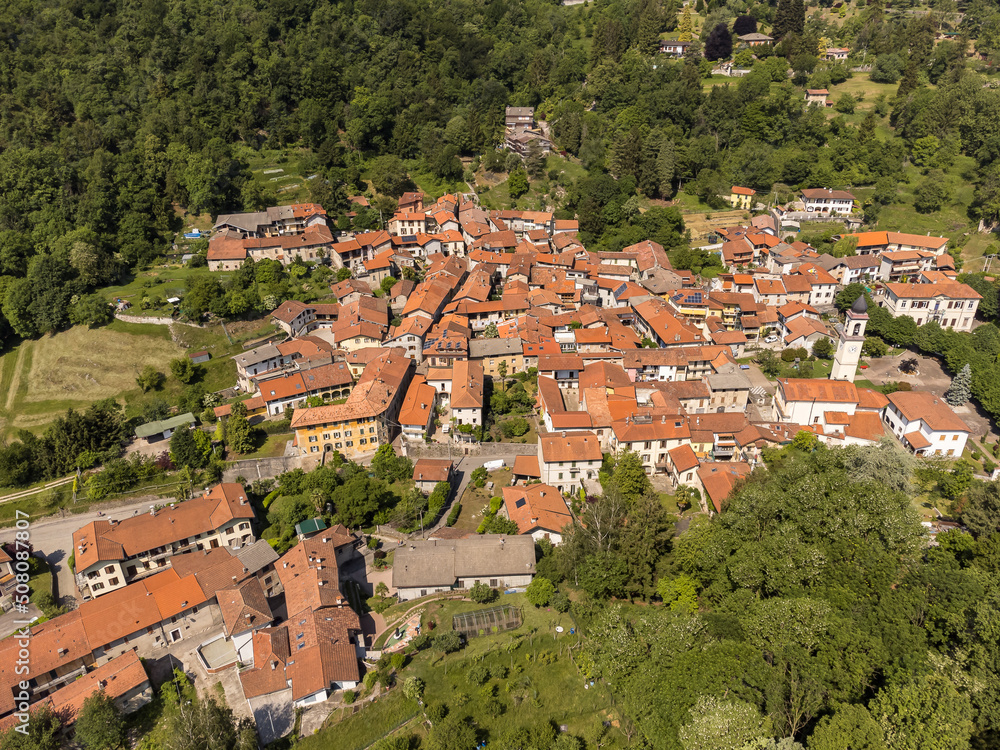 Aerial view of small Italian village Cassano Valcuvia at spring time, situated in province of Varese, Lombardy, Italy