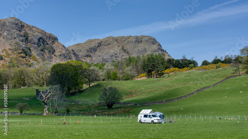 Coniston, United Kingdom - 21st April 2022 : A VW camper van in an isolated spot near the town of Coniston photo