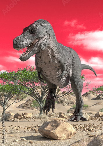 tyrannosaurus standing up alone on desert