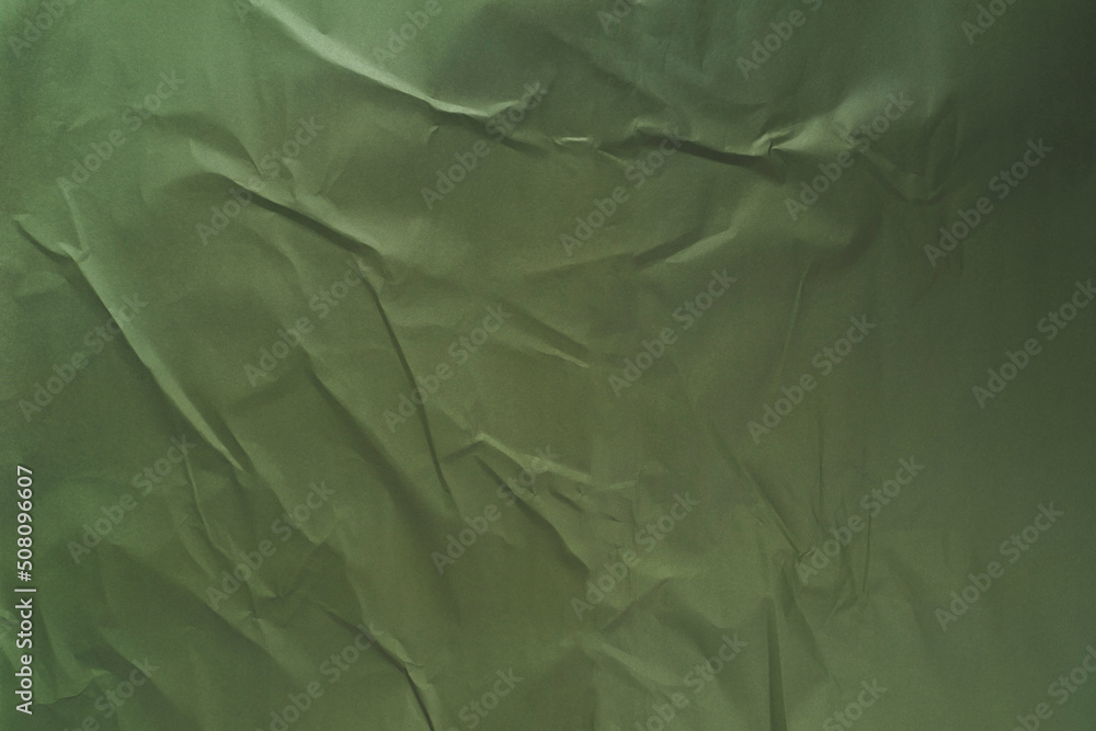 Obraz premium green crumpled paper texture background
