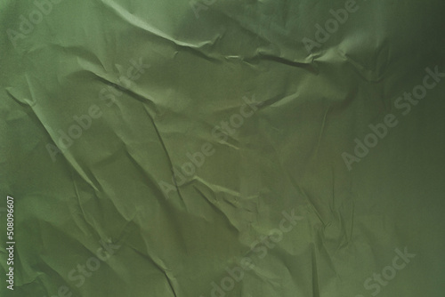 green crumpled paper texture background