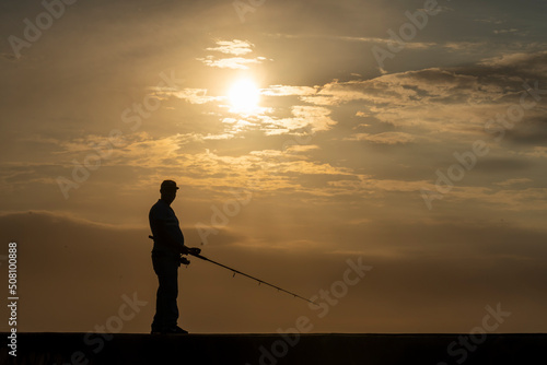 Contraluz pescador