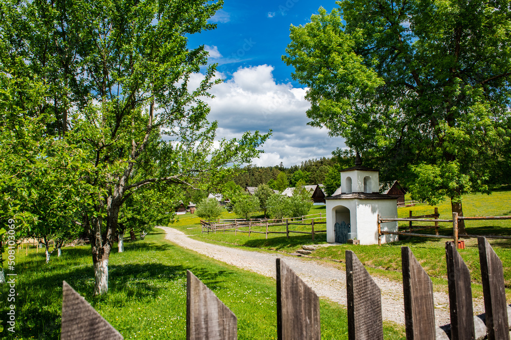 Skansen with wooden village houses near Sara Lubovna Castle in Slovakia at summer Skansen with wooden village houses near Sara Lubovna Castle in Slovakia at summer