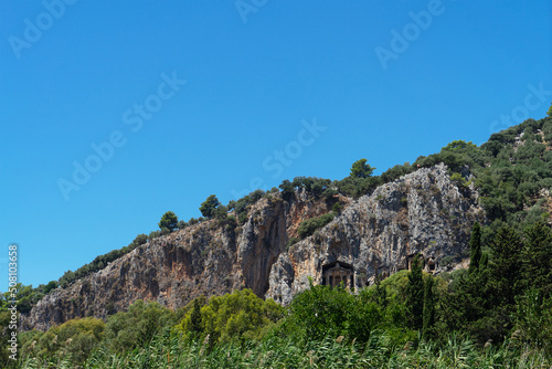Lycian tombs near Dalyan across the Dalyan river in Mugla Province located between the districts of Marmaris and Fethiye on the south-west coast of Turkey © Olga