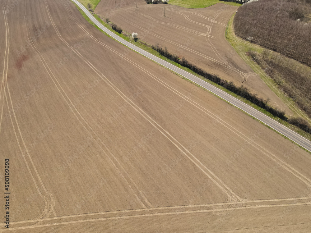 Aerial view of a farmland on a sunny spring day