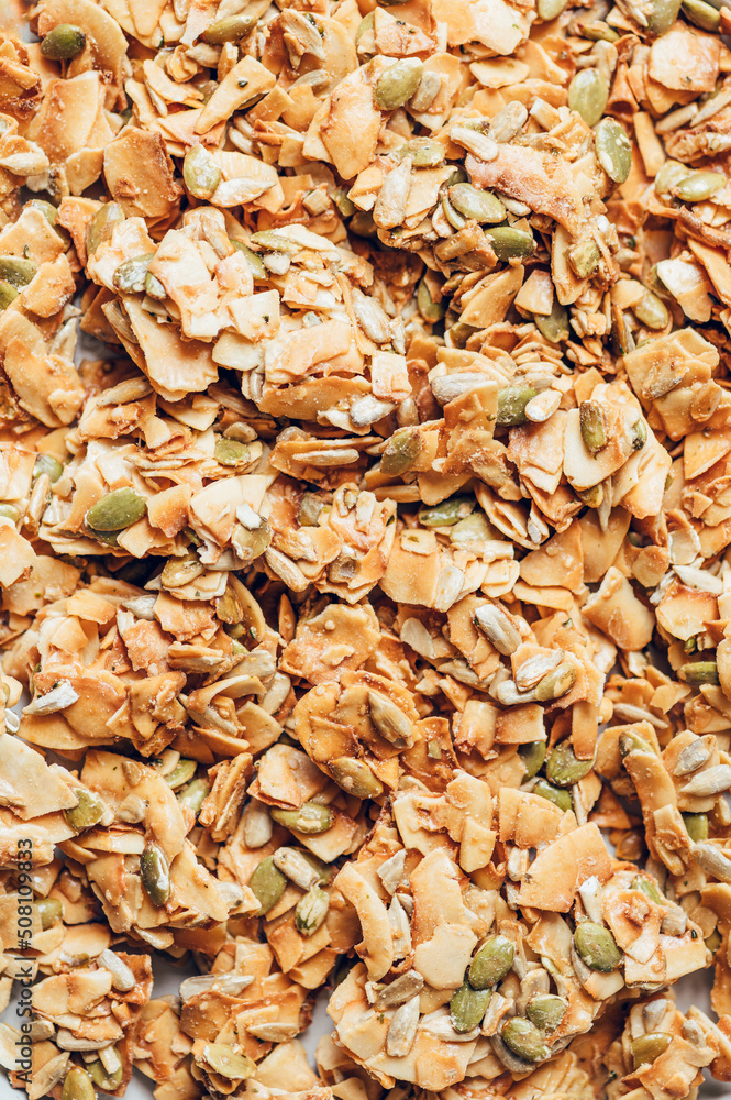 Organic Coconut Keto Clusters, crunchy pumpkin, sunflower, hemp seeds, providing healthy snack. Gluten Free, Vegan Friendly Organic Coconut Keto Clusters, crunchy pumpkin, sunflower, hemp seeds, providing healthy snack. Gluten Free, Vegan Friendly