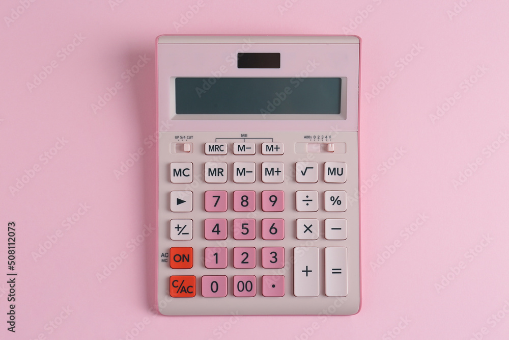 Modern calculator on pink background, top view Modern calculator on pink background, top view