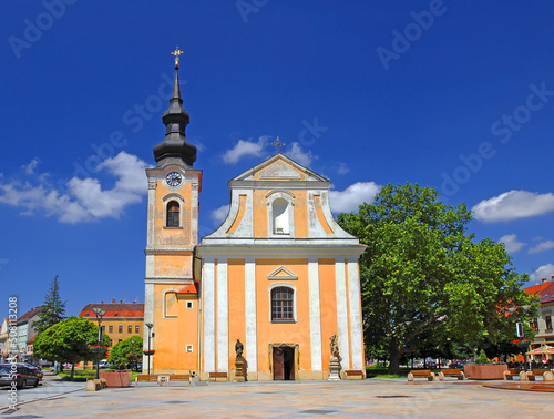 The main square and church of Hodonin town. Moravia, Czech republic photo