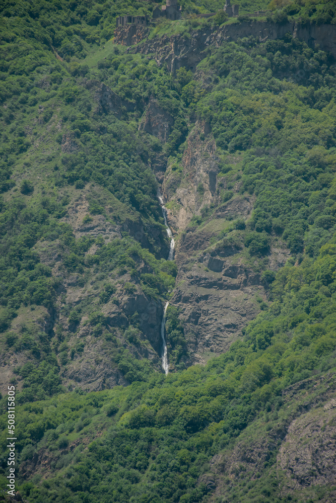 waterfall in the mountains waterfall in the mountains