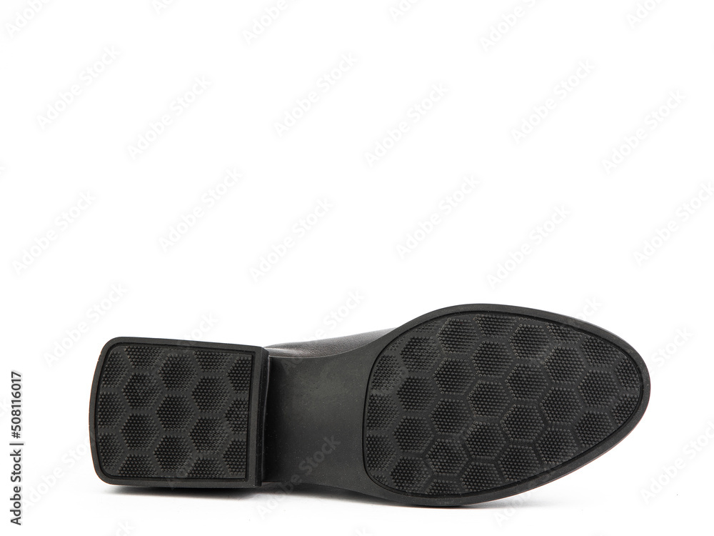 Sole for shoes, bottom view. Shoe sole close-up isolated on white background. place for text. Element of boots. Concept of production of shoe. Sole for shoes, bottom view. Shoe sole close-up isolated on white background. place for text. Element of boots. Concept of production of shoe.