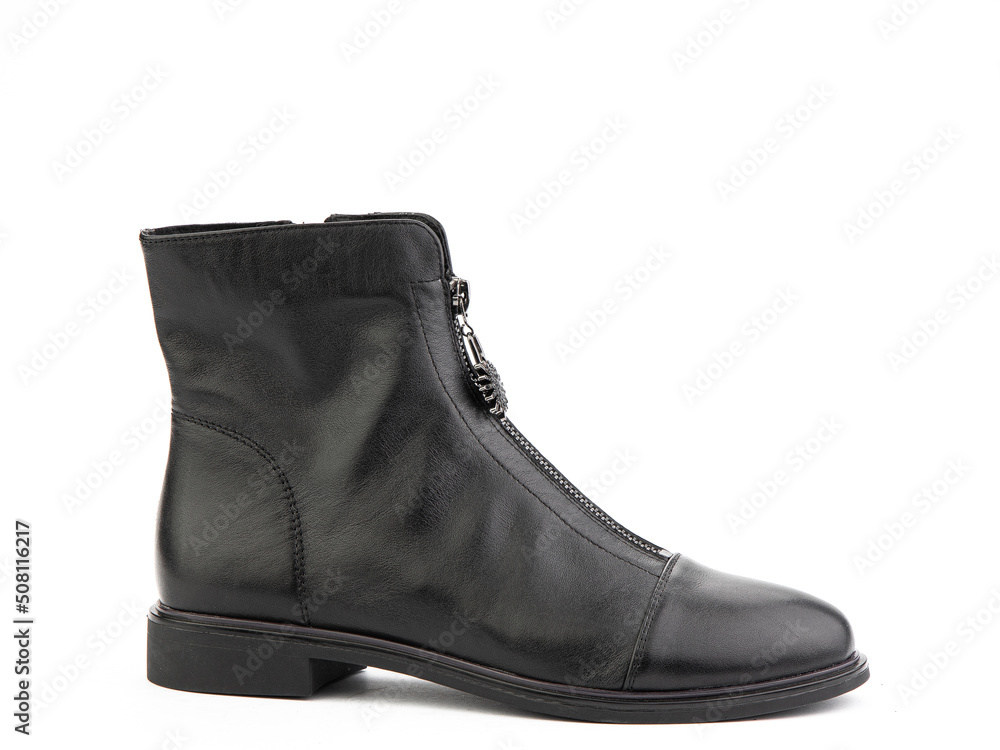 Women's autumn black leather jodhpur boots with zip and average heels, isolated white background. Right side view. Fashion shoes.