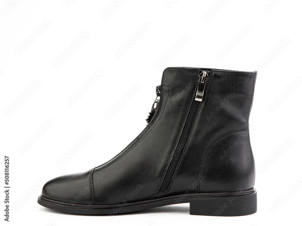 Women's autumn black leather jodhpur boots with zip and average heels, isolated white background. Left side view. Fashion shoes.