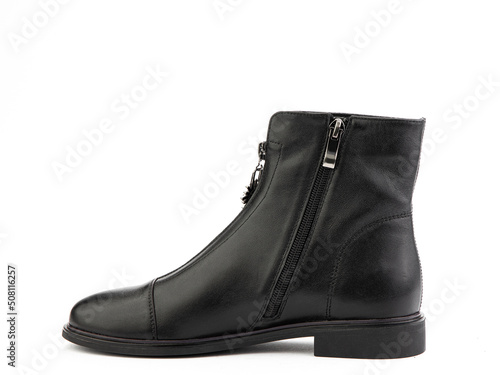 Women's autumn black leather jodhpur boots with zip and average heels, isolated white background. Left side view. Fashion shoes.