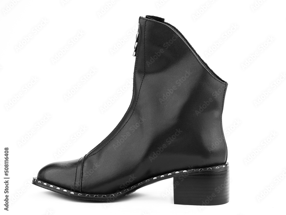 Women's autumn black leather jodhpur boots with zip and average heels, isolated white background. Left side view. Fashion shoes.