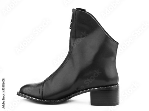 Obraz na płótnie Women's autumn black leather jodhpur boots with zip and average heels, isolated white background. Left side view. Fashion shoes. w salonie